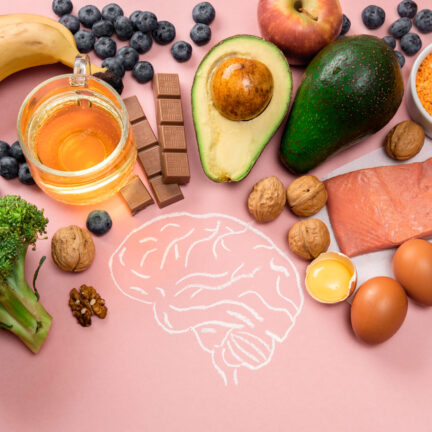 Best foods for brain and memory on pink background. Food for mind and charge of energy. Healthy lifestyle. Copy space. Top view